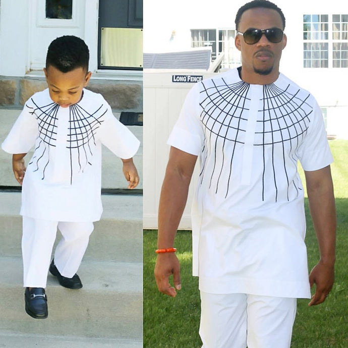 Baby and Daddy bold rich embroidery design white color African dress